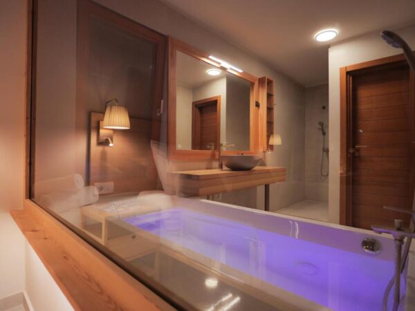 View of the whirlpool bath from bedroom window