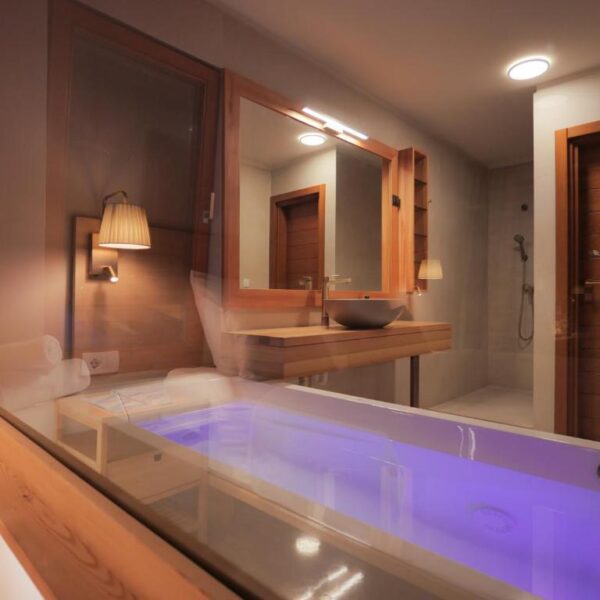 View of the whirlpool bath from bedroom window