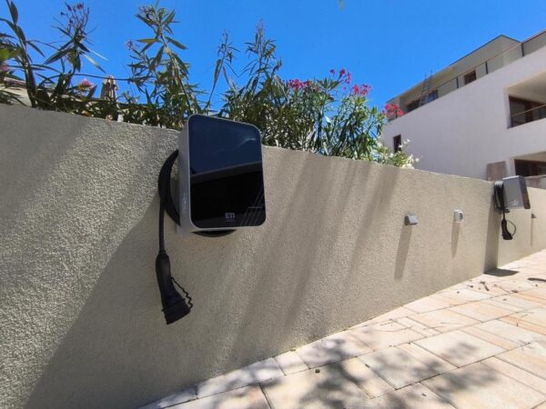 View of parking spaces with chargers for electrical vehicles