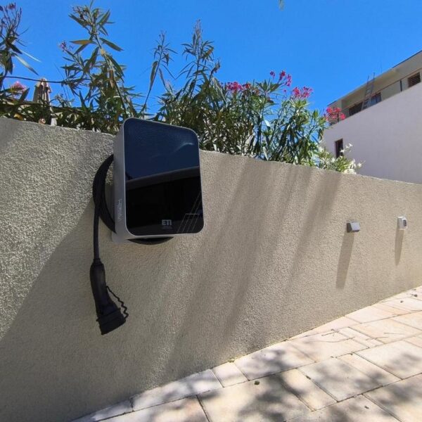 View of parking spaces with chargers for electrical vehicles