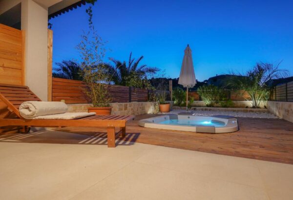 View of the premium studio jacuzzi during nighttime