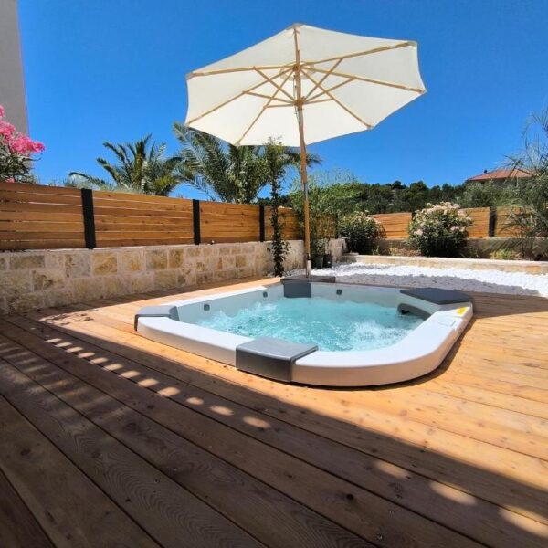 View of the premium studio jacuzzi during daytime